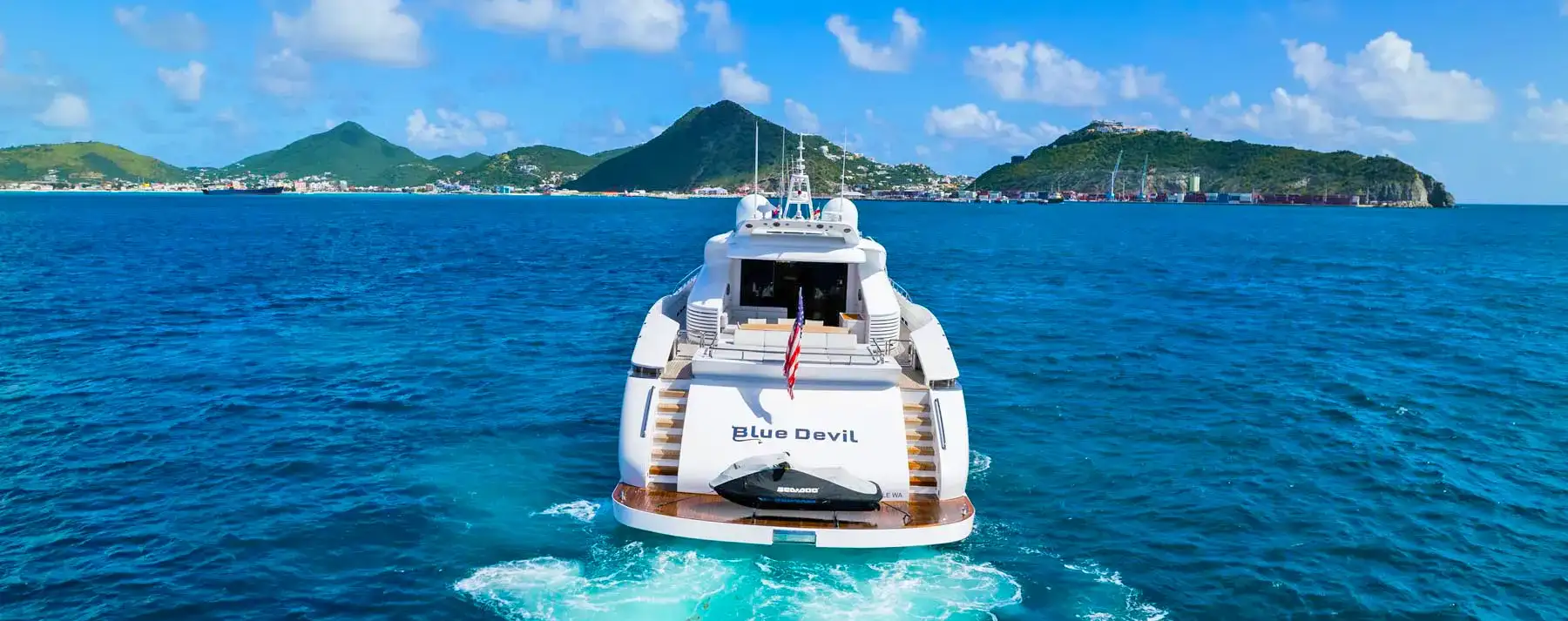 "Blue Devil Elegance: 140ft Luxury Yacht in Caribbean Waters"