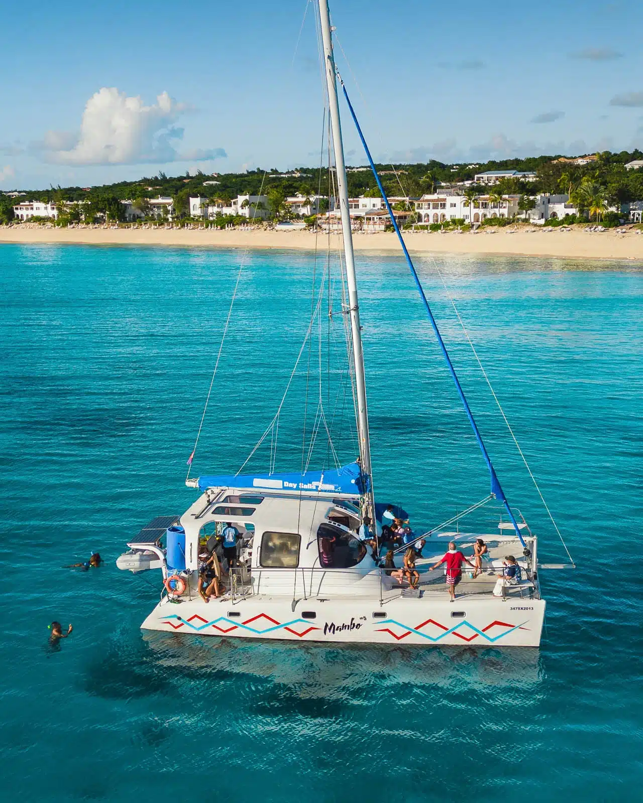 Mambo Boat, Clear Water, White Sand